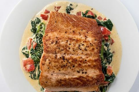 Illustrative cedar-roasted salmon; presentation may differ